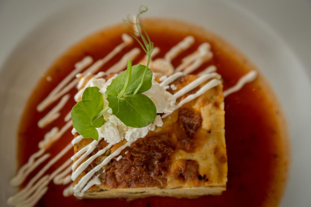 Suites Contempo México DF Exterior foto A piece of quiche with a garnish